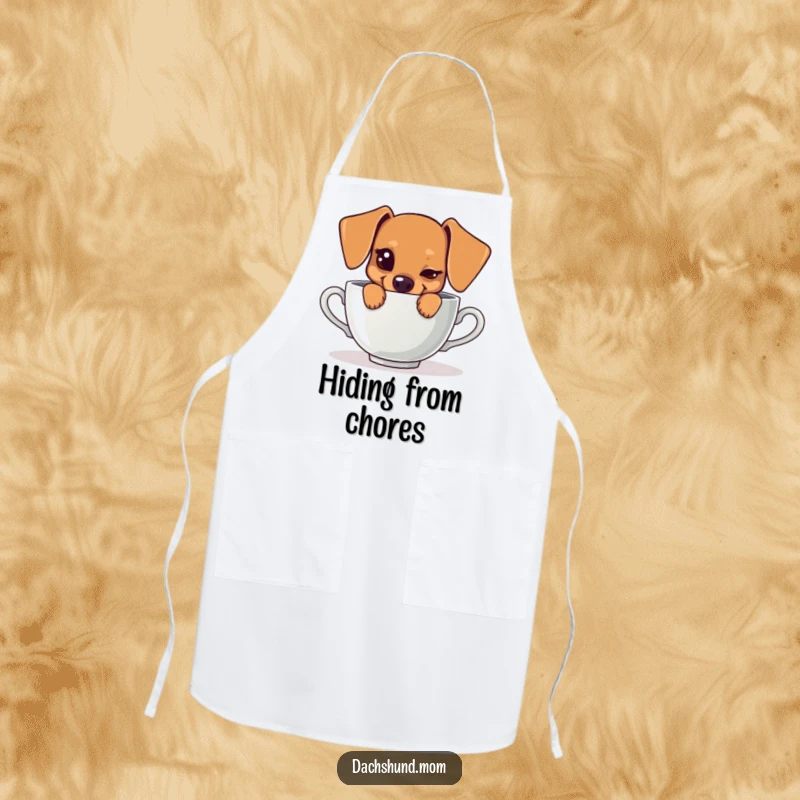 Funny apron featuring a kawaii dachshund peeking from behind a teacup with a mischievous wink, adding humor to cooking.