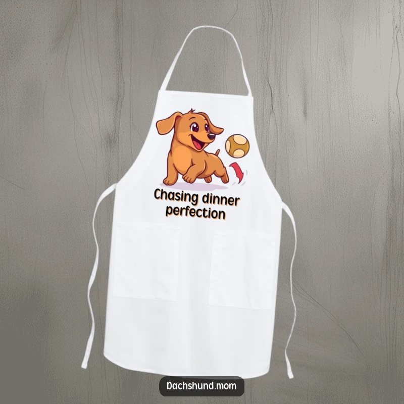 Funny apron showcasing a happy, small wiener dog enthusiastically chasing a bouncing ball with cheerful determination.
