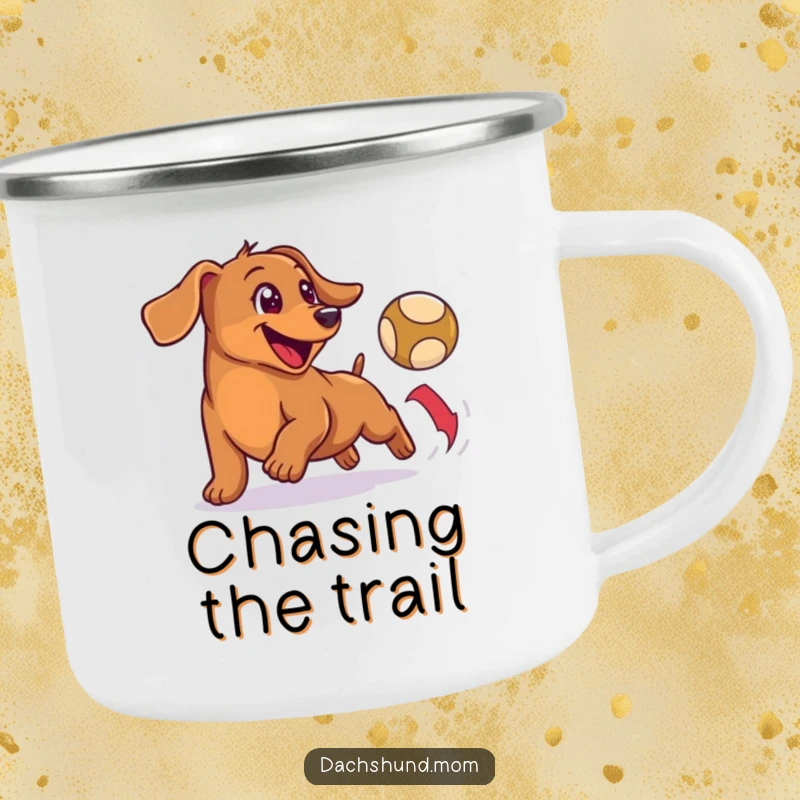 Funny camping mug with a happy, small wiener dog enthusiastically chasing a bouncing ball, ideal for outdoor enjoyment.