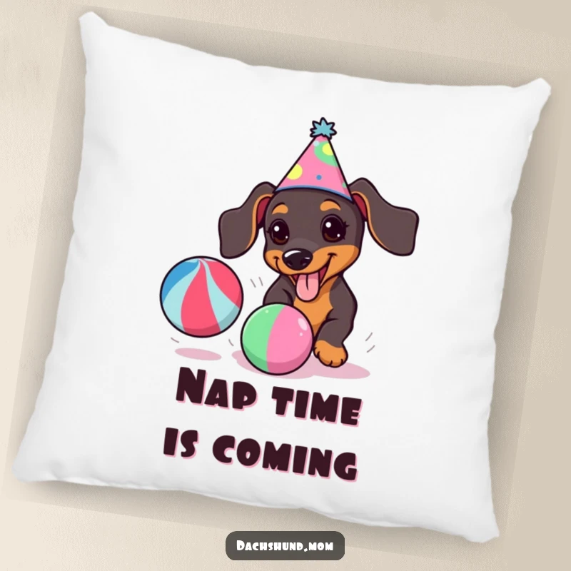 Funny kawaii dachshund wearing a party hat, joyfully chasing a colorful ball, on a soft decorative pillow.