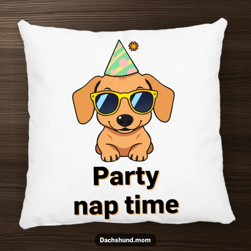Funny decorative pillow featuring a dachshund wearing sunglasses and a party hat, adding a festive and humorous touch.
