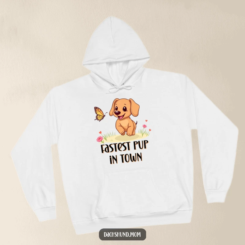 Funny Dachshund puppy hoodie, a cute dog joyfully pursuing a butterfly, embodying pure playful energy.