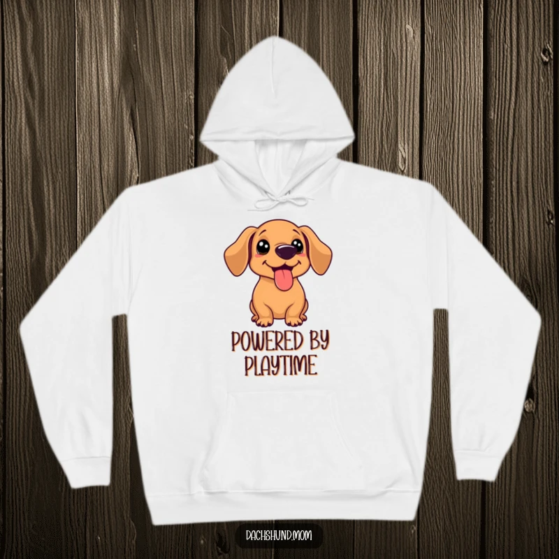 Funny kawaii dachshund with tongue out, panting happily after a game, on a cozy hoodie, ideal for cold days.