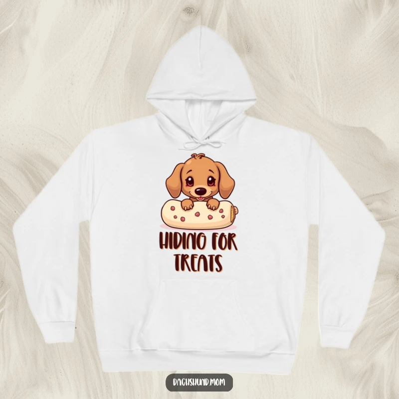 Funny Dachshund Hoodie: A cute kawaii dachshund peeking from behind a large treat, conveying playful desire and humor.