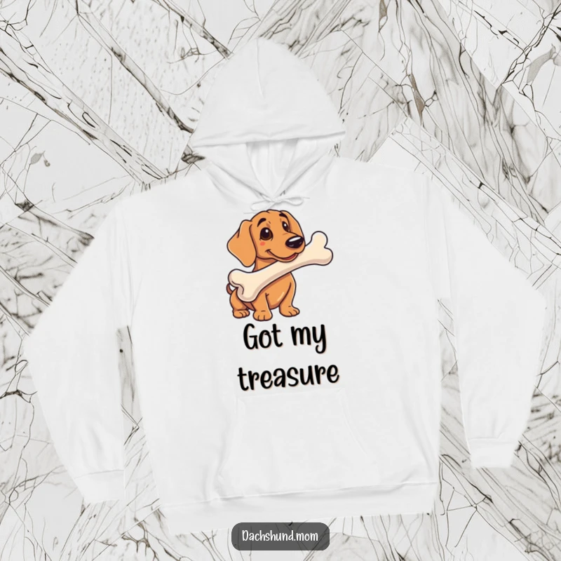 Funny hoodie depicting a dachshunds proudly posing with an oversized bone, looking incredibly pleased with its find.