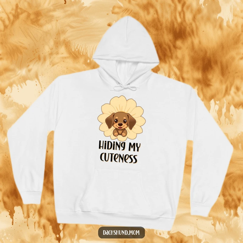 Funny kawaii dachshund peeking from behind a big happy flower, featured on a soft, cozy hoodie.