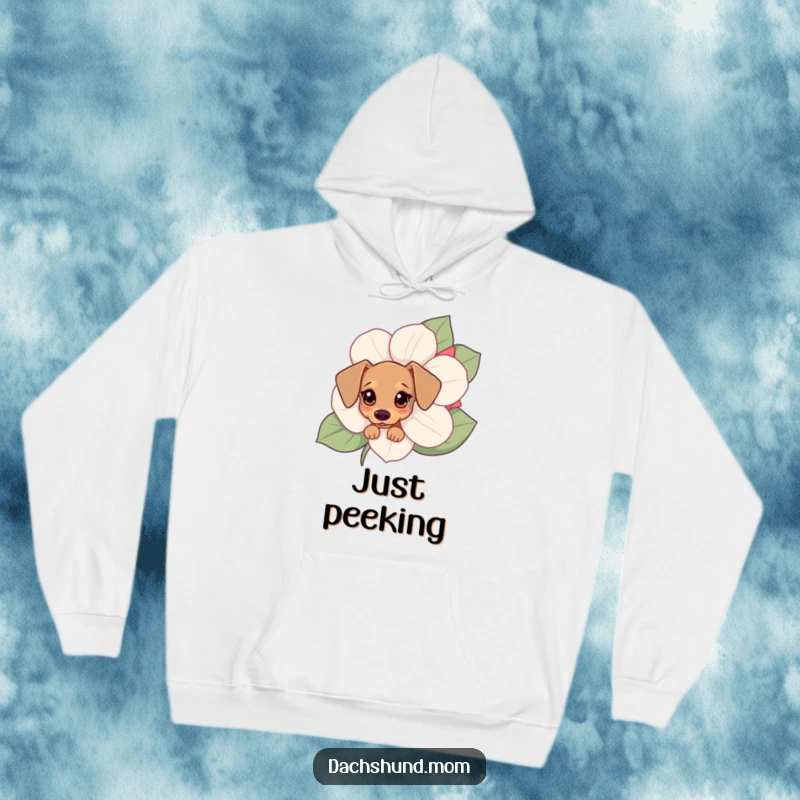 Funny Kawaii dachshund hoodie featuring a small dog with curious eyes peeking from behind a large flower, perfect for cozy days.