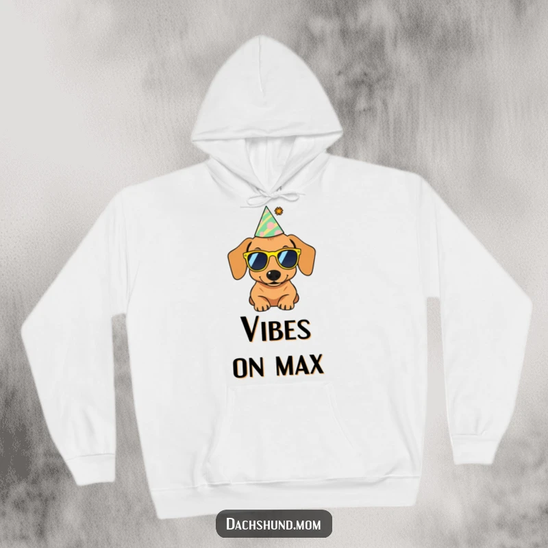 Funny hoodie depicting a dachshund wearing tiny sunglasses and a party hat, exuding a cool and celebratory mood.