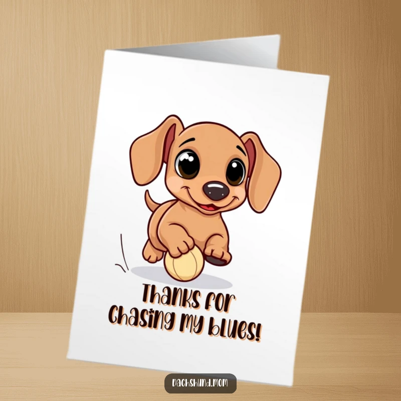 Funny Free Printable Thank You Card: Kawaii dachshund with exaggerated eyes, enthusiastically chasing a tiny ball.