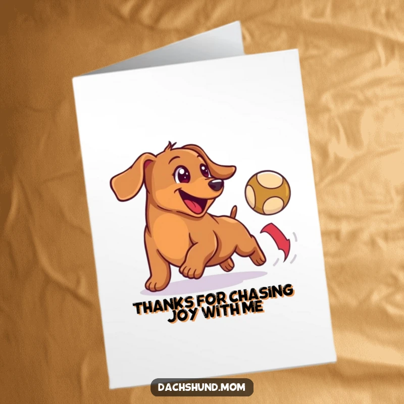 Funny Free Printable Wiener Dog Thank You Card: A happy wiener dog enthusiastically chasing a bouncing ball, conveying thanks with playful energy.