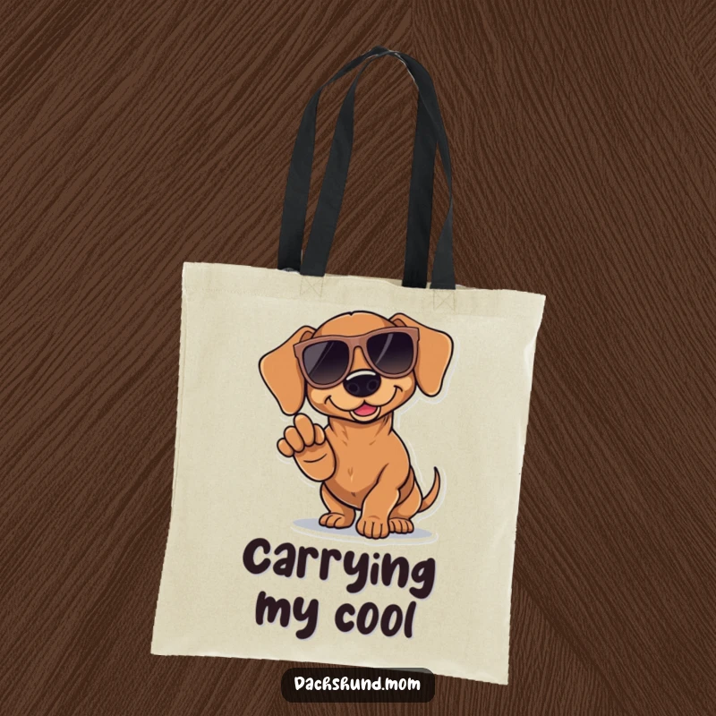 Funny Kawaii Dachshund Tote Bag: a dachshund wearing oversized sunglasses, drawing attention with a dramatic paw point, stylishly cool.