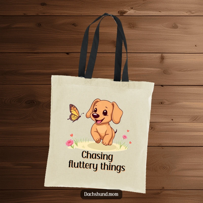 Funny Dachshund puppy tote bag illustration of a joyful pup chasing a butterfly, a delightful accessory.